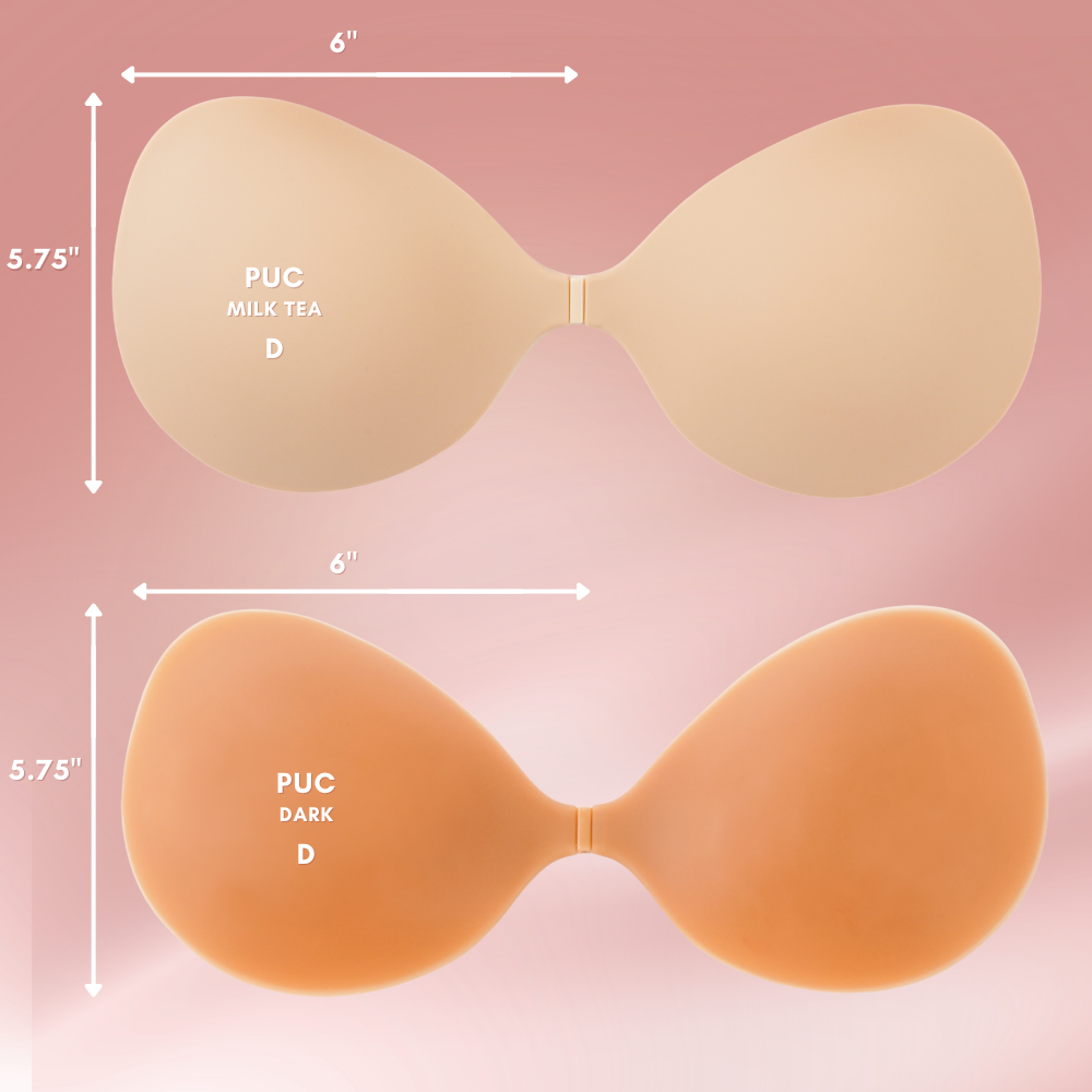 Two silicone bra cups with measurements and color labels on a pink background