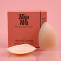 Nip Nu sticky triangle covers with packaging on a pink background